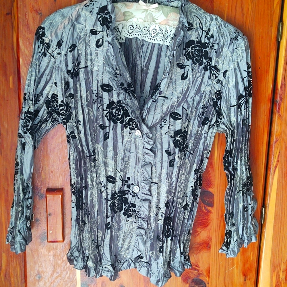 23rd St ruffled satin blouse.  Grey with raised black roses design. Size Medium
